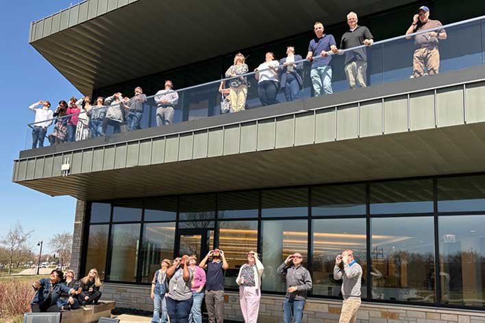 CHEST staff views the 2024 solar eclipse from headquarters